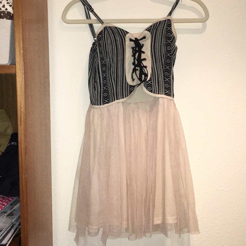 Dress with corset on top and ballerina flow